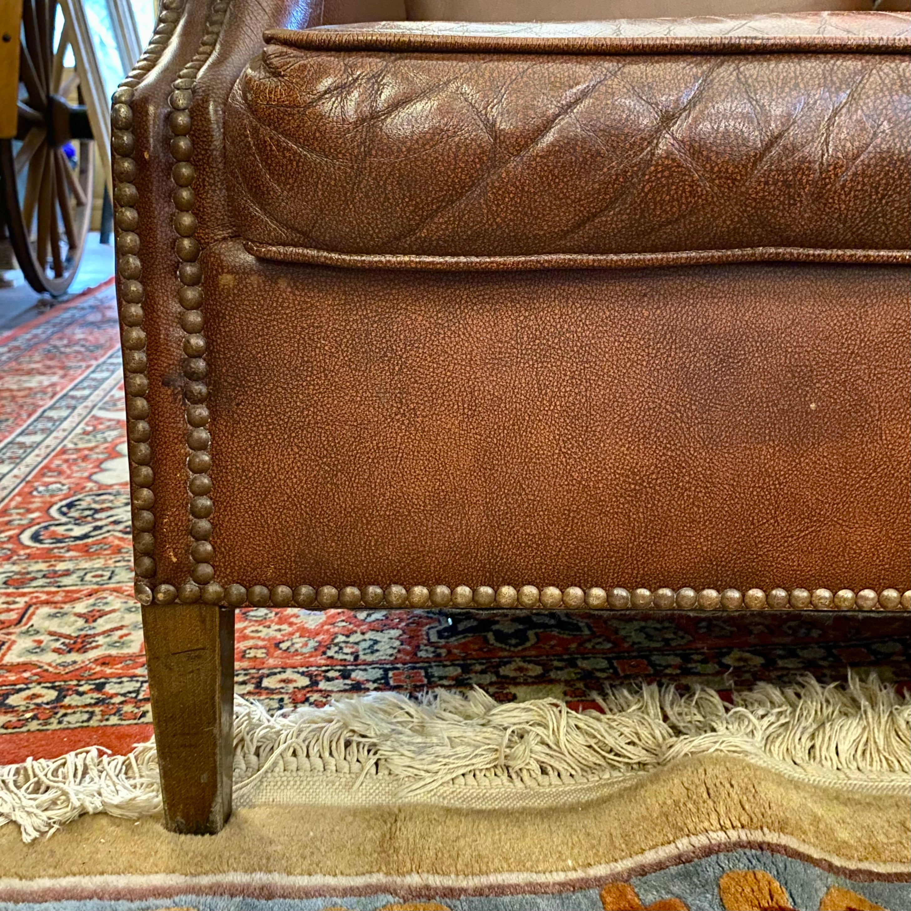 A pair of Dark Leather armchairs