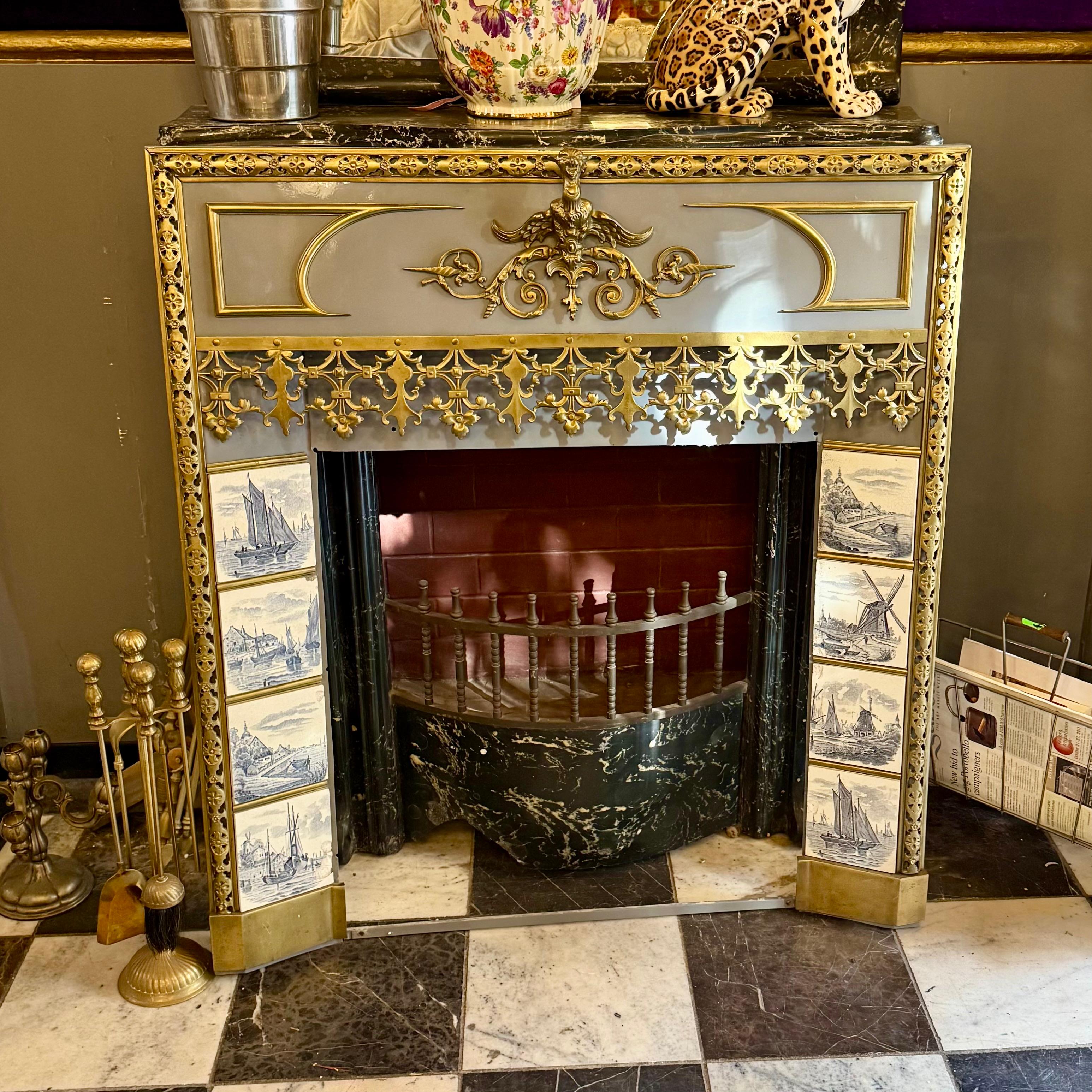 Unusual Enameled Fireplace with Delft Tiles and Gilt Brass Details