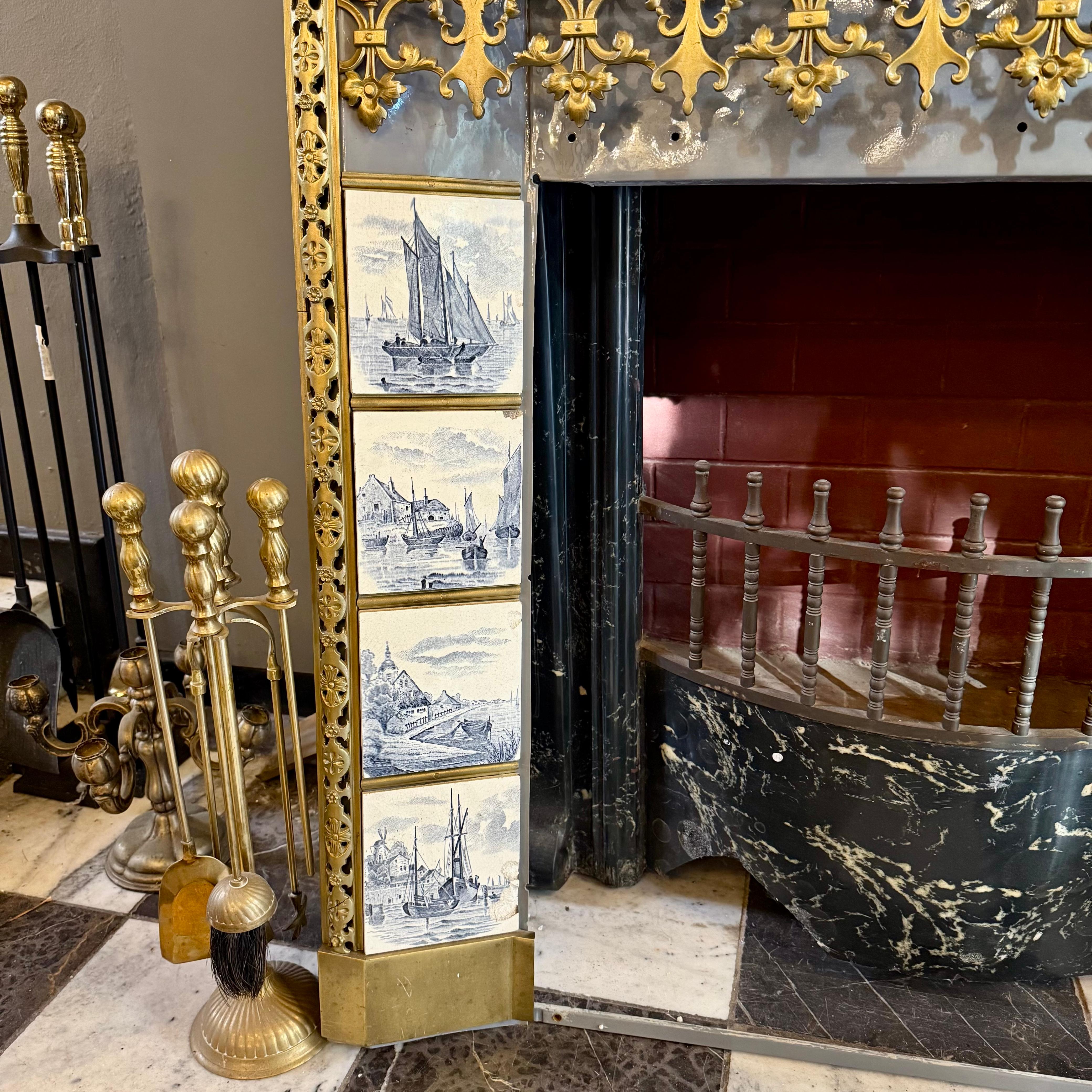 Unusual Enameled Fireplace with Delft Tiles and Gilt Brass Details