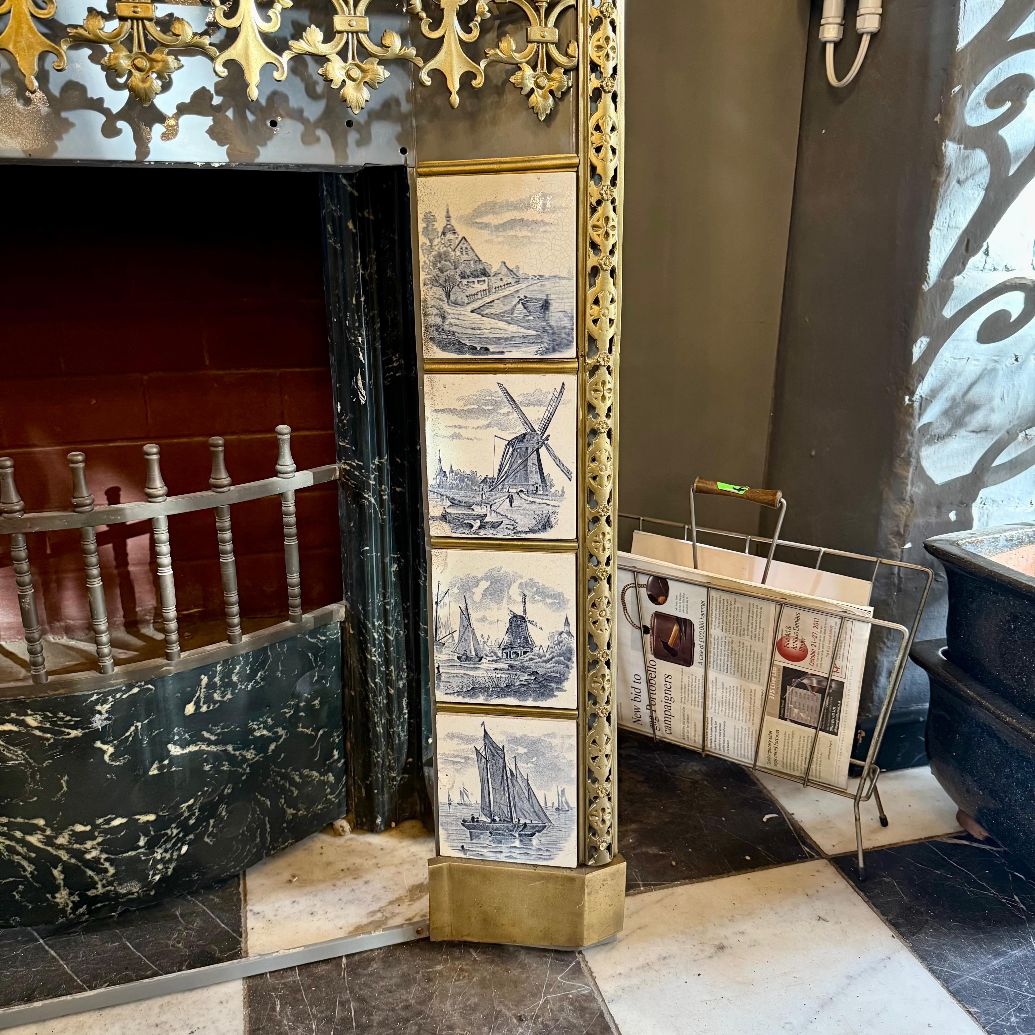 Unusual Enameled Fireplace with Delft Tiles and Gilt Brass Details