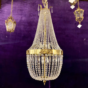 A Very Large Brass and Crystal Neoclassical Chandelier