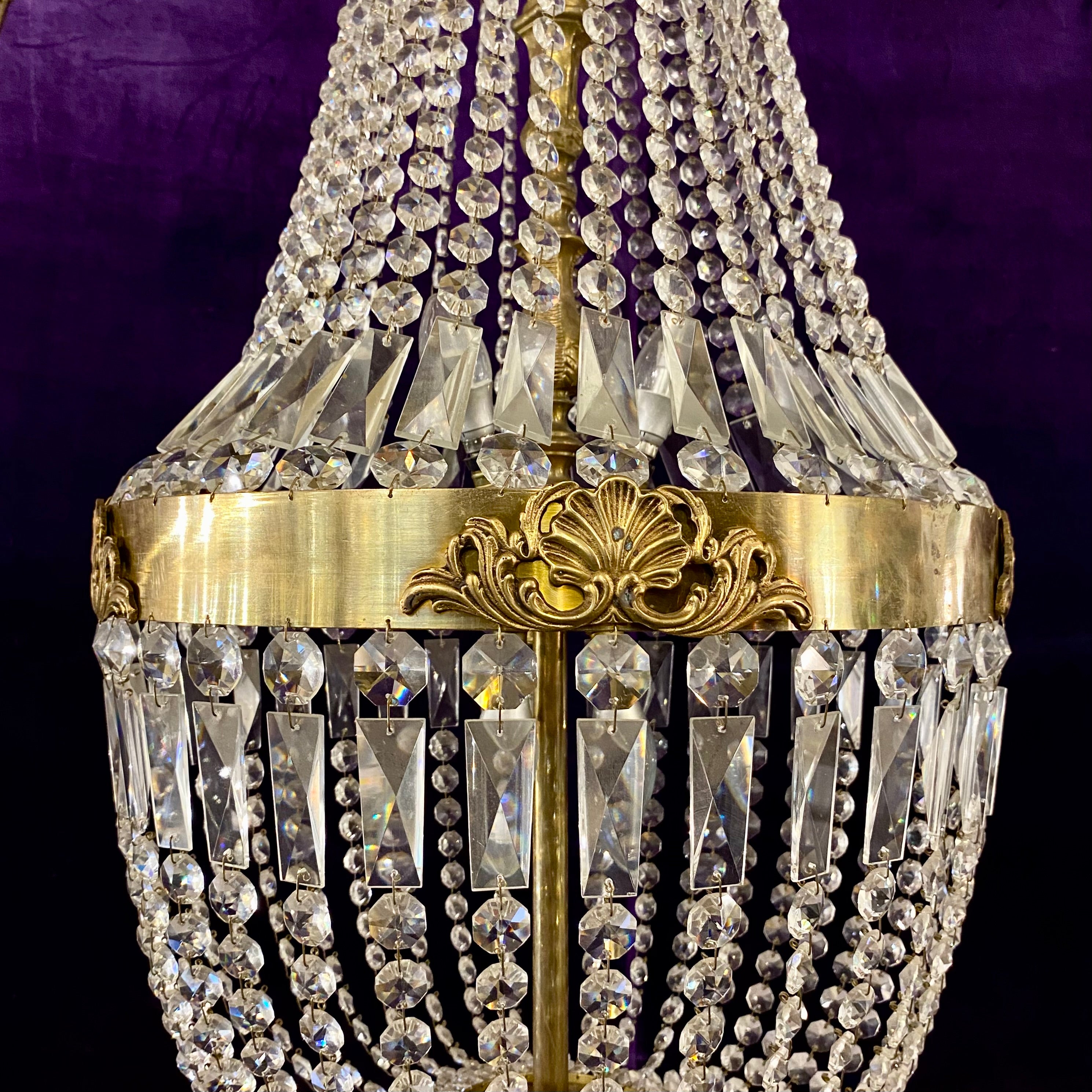 A Very Large Brass and Crystal Neoclassical Chandelier