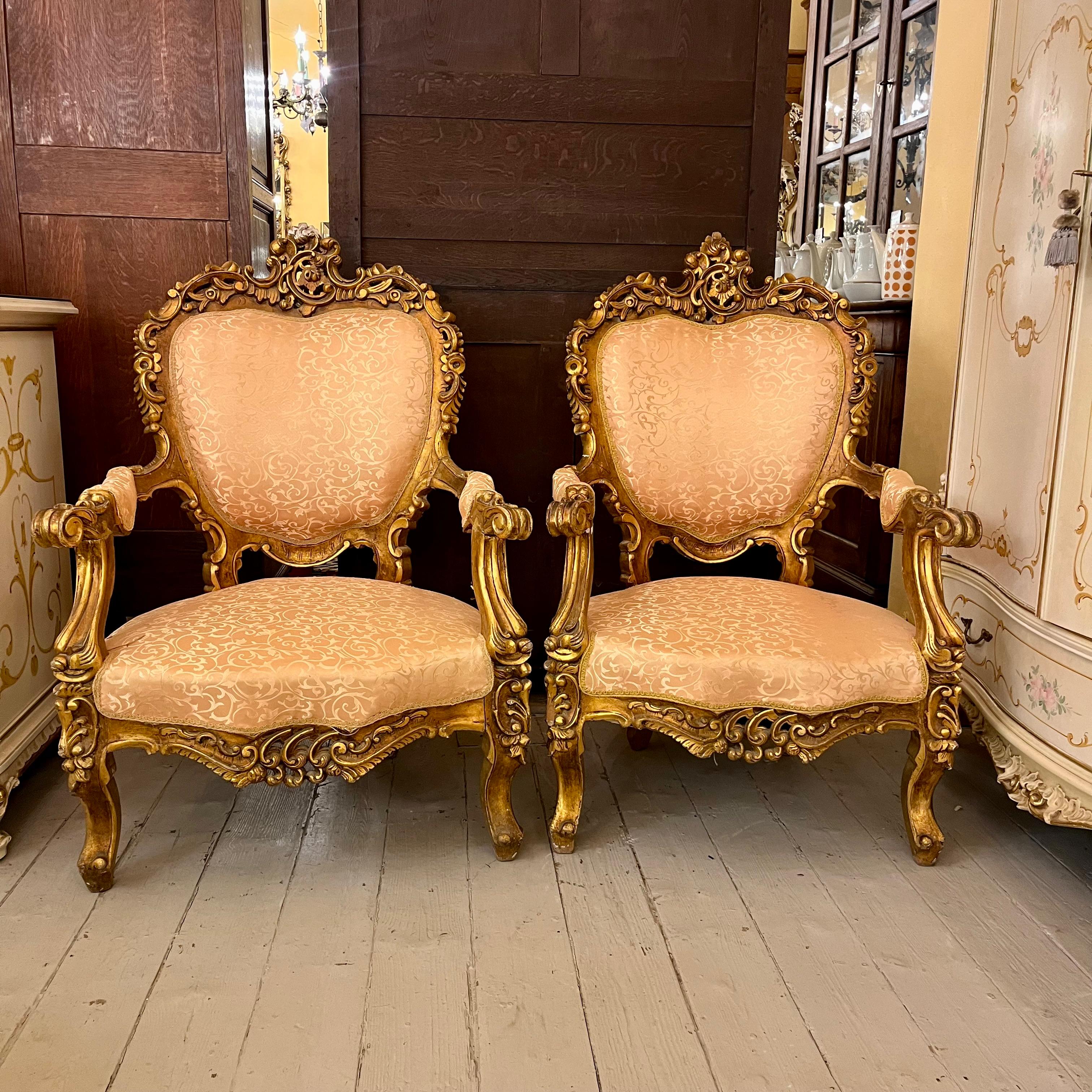 Grand Louis XV Giltwood Armchairs