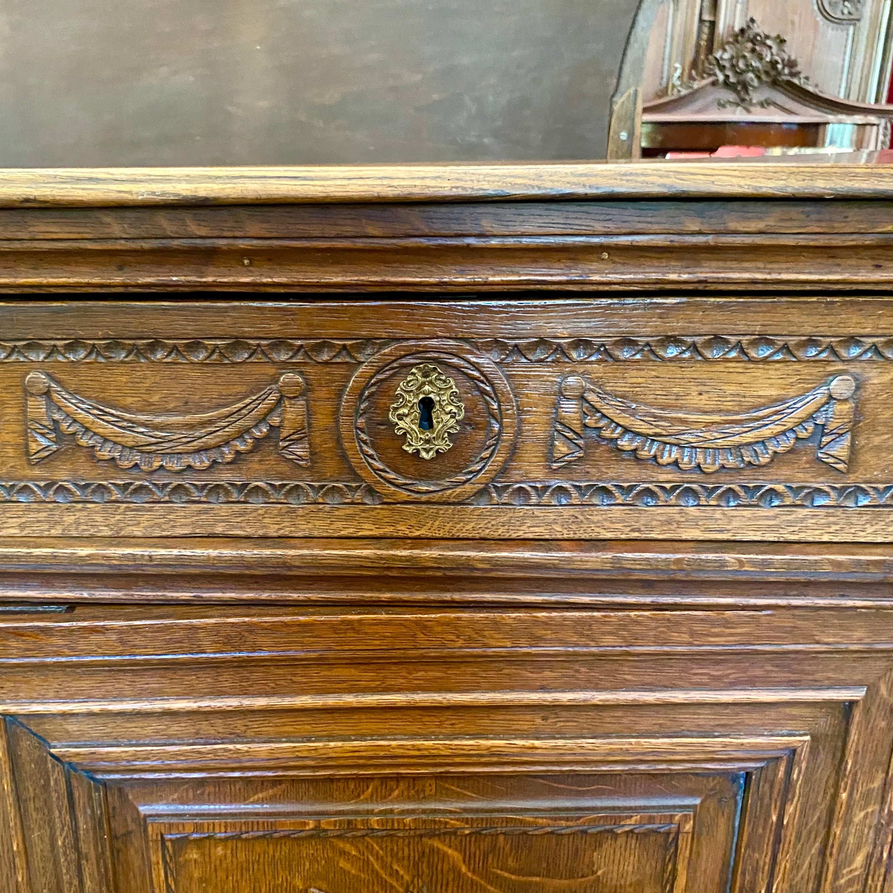 Antique Carved Oak Cabinet with Brass Fixtures