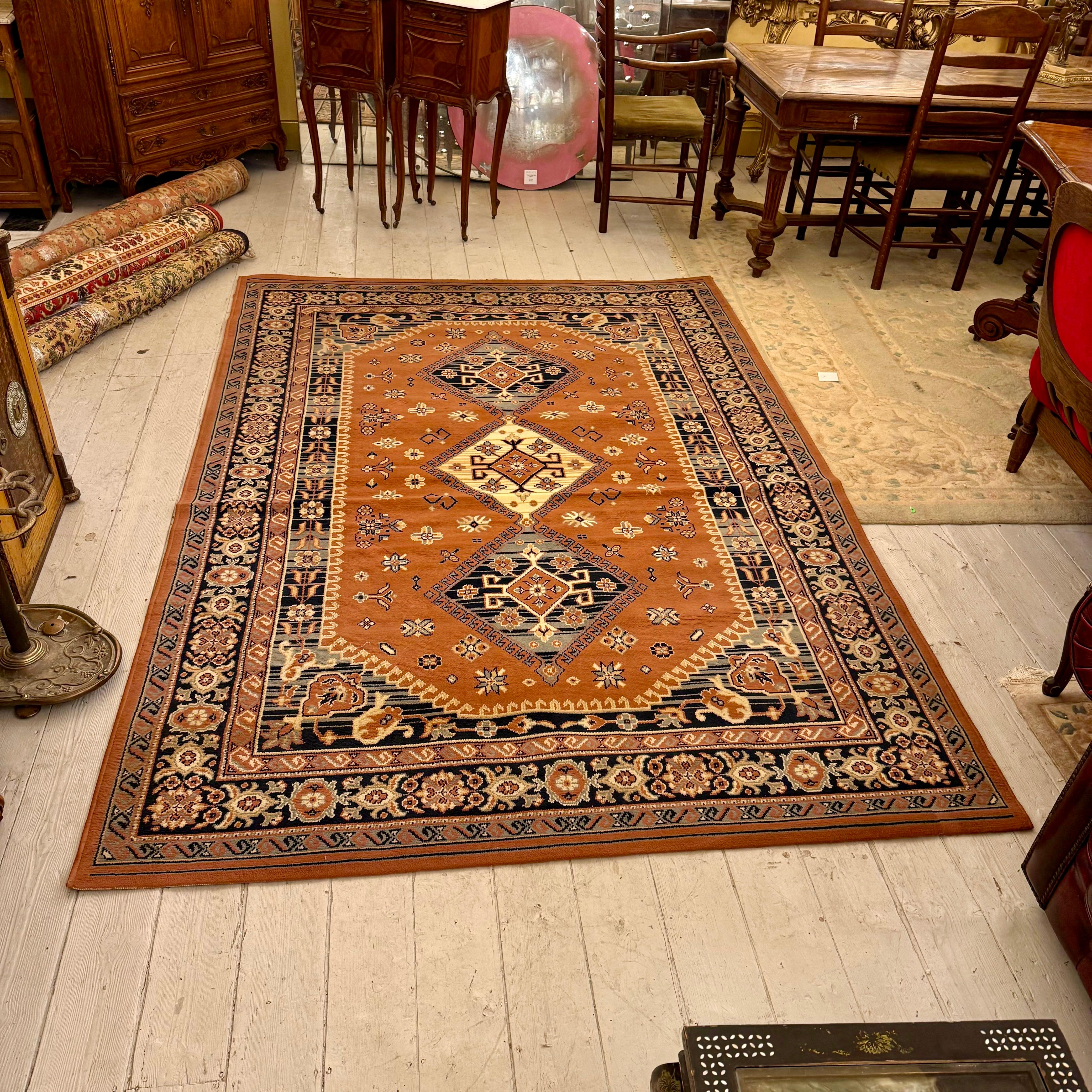 Geometric Rug in Rust and Navy Tones, Middle Eastern, c. Late 20th Century