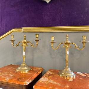 An Antique Pair of Brass Candelabras