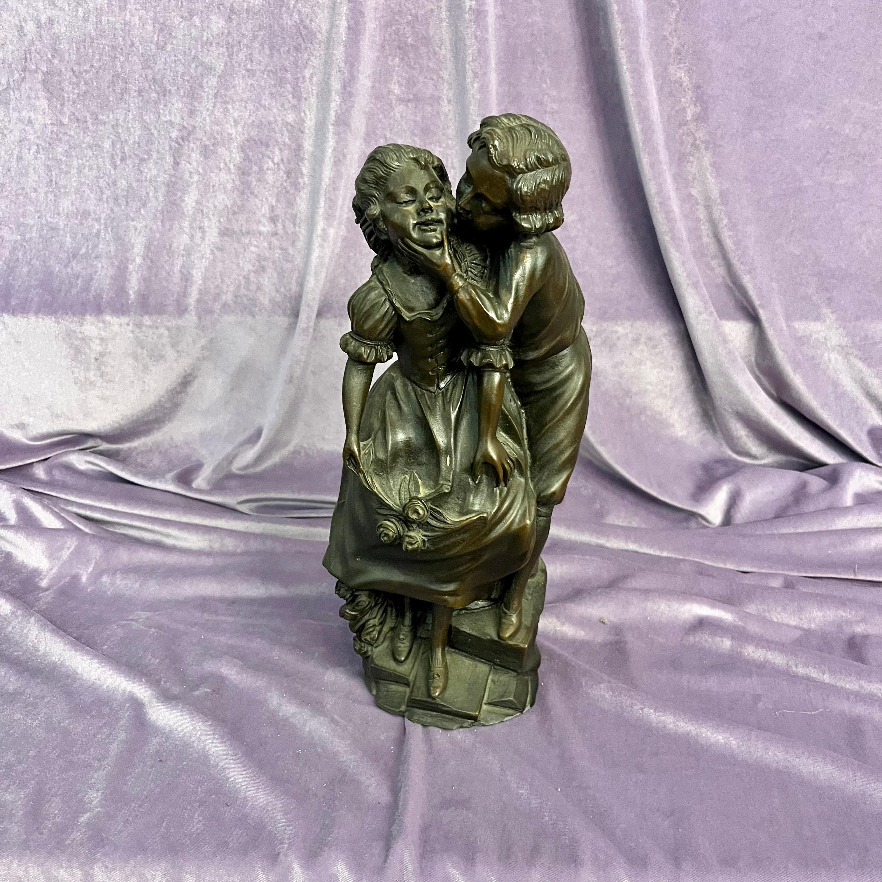 Antique Cast Statuette of Boy Kissing Girl