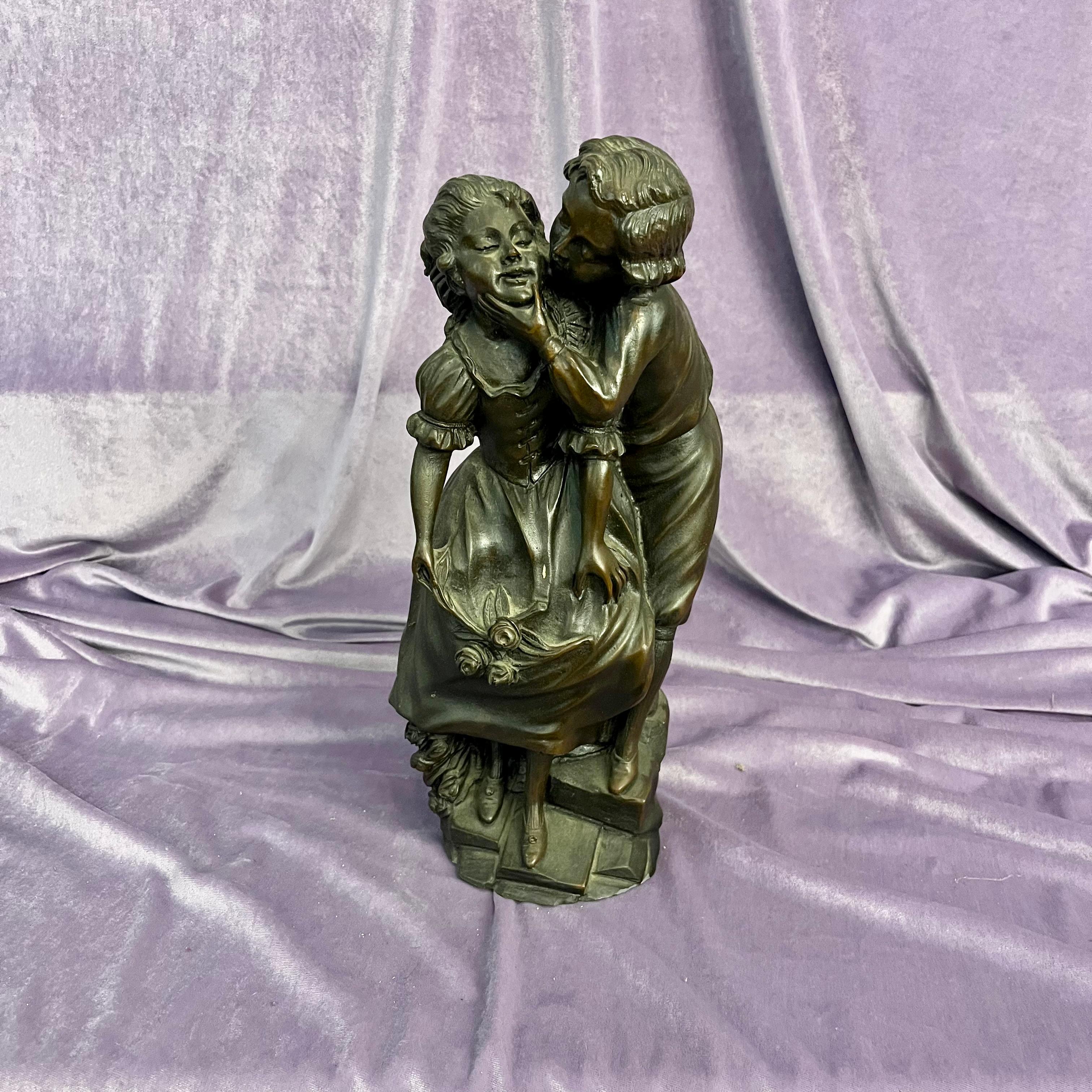 Antique Cast Statuette of Boy Kissing Girl