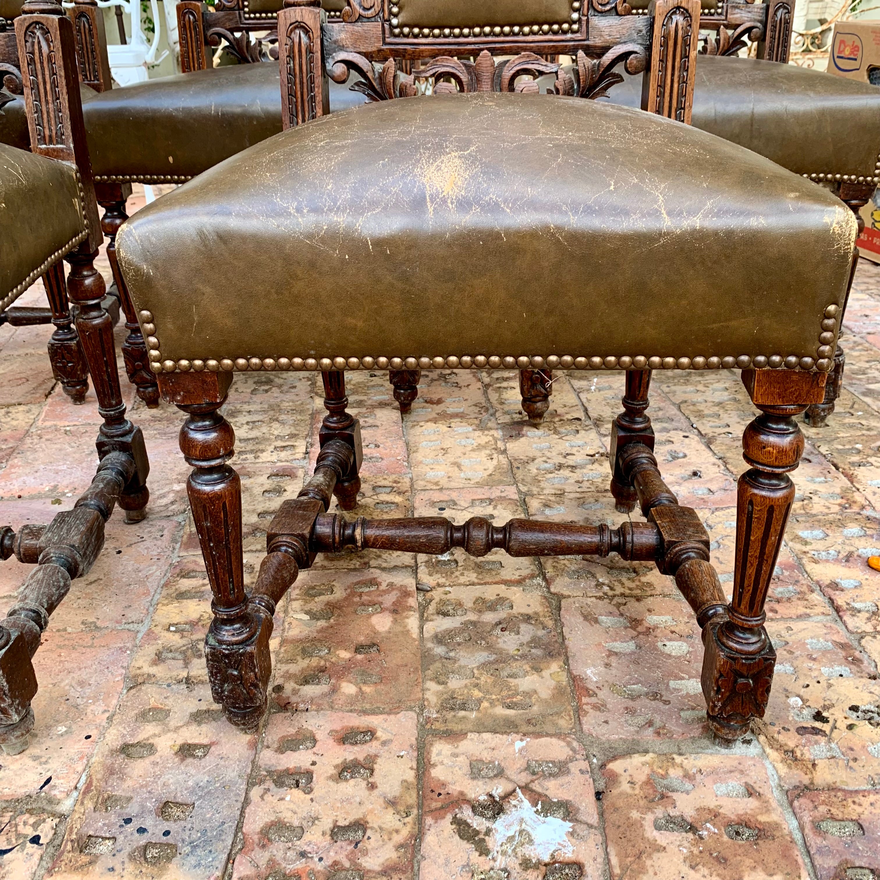 Antique French Carved Dark Oak And Leather Dining Chairs