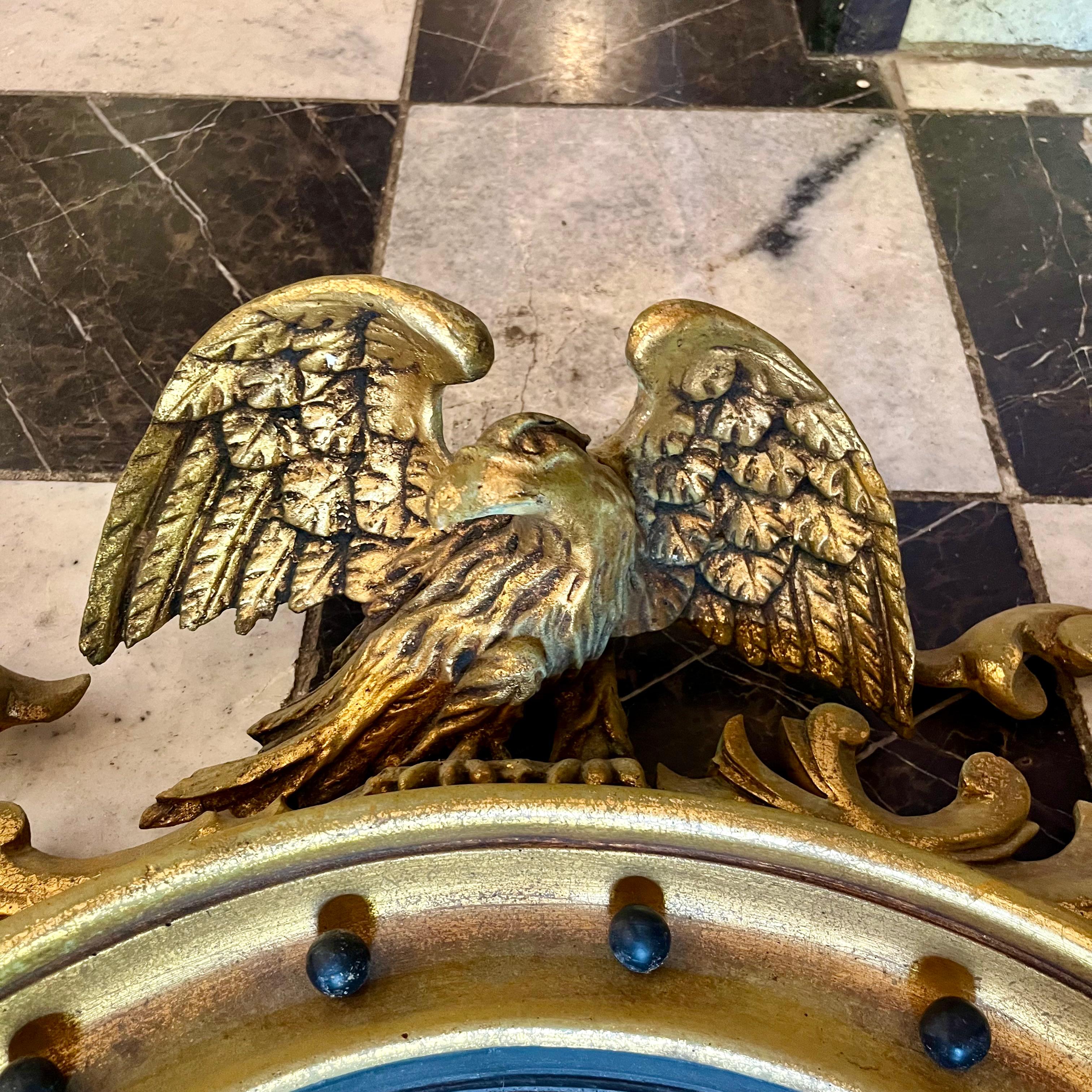 Vintage Gold Round Mirror Adorned with an Eagle