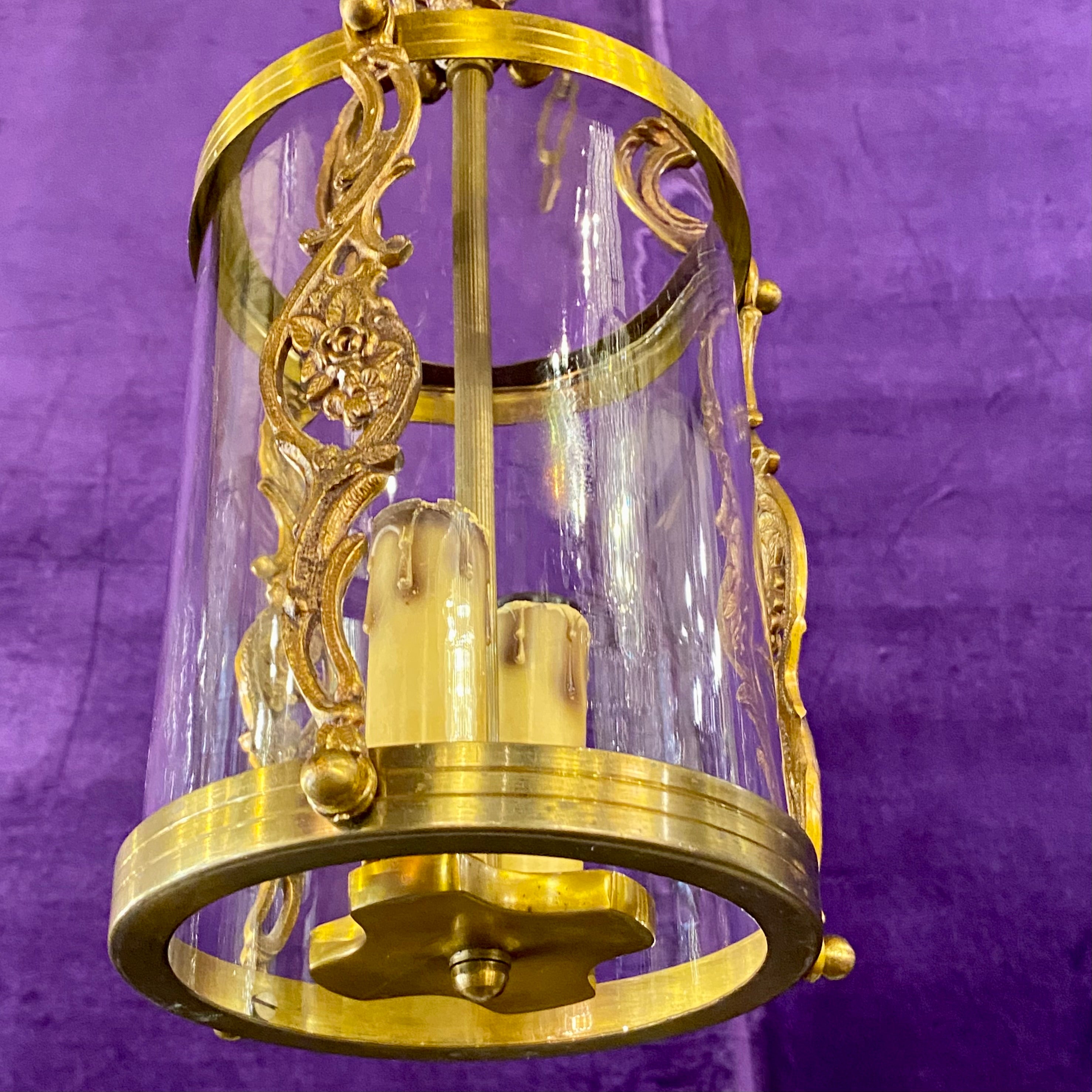 A Pair of Polished Brass Lanterns