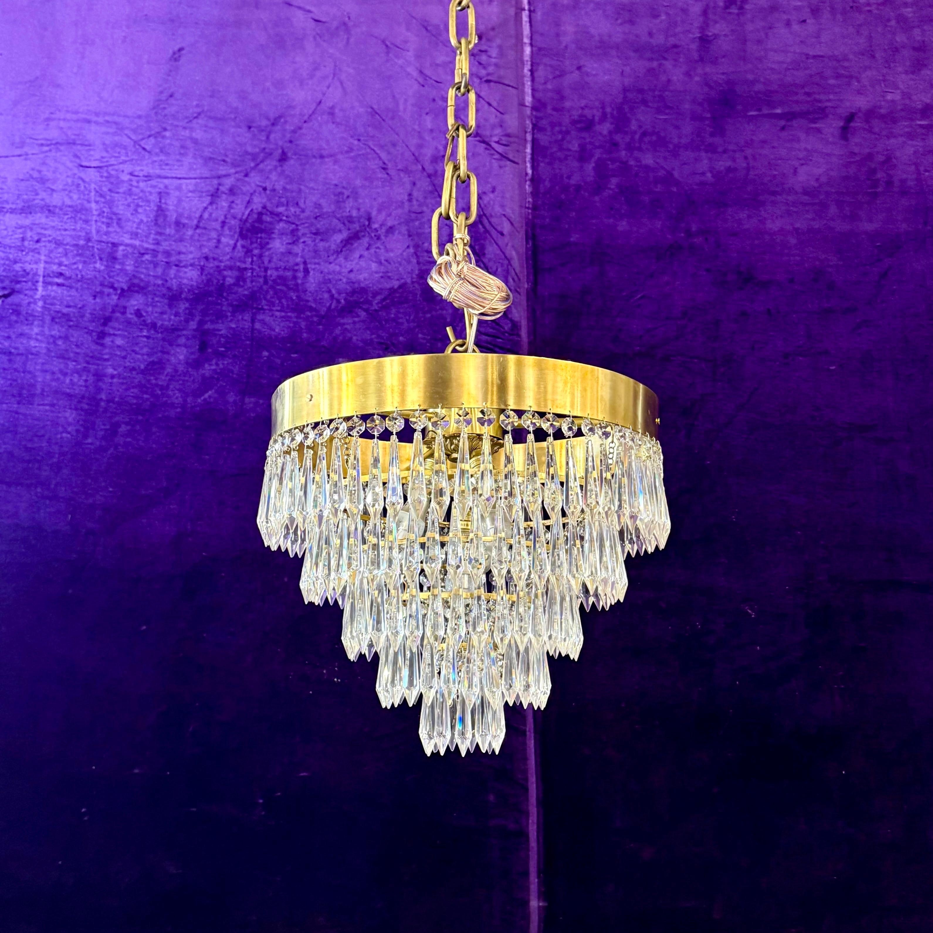 Delos Custom Waterfall Chandelier with Polished Brass Band and Spear Crystals