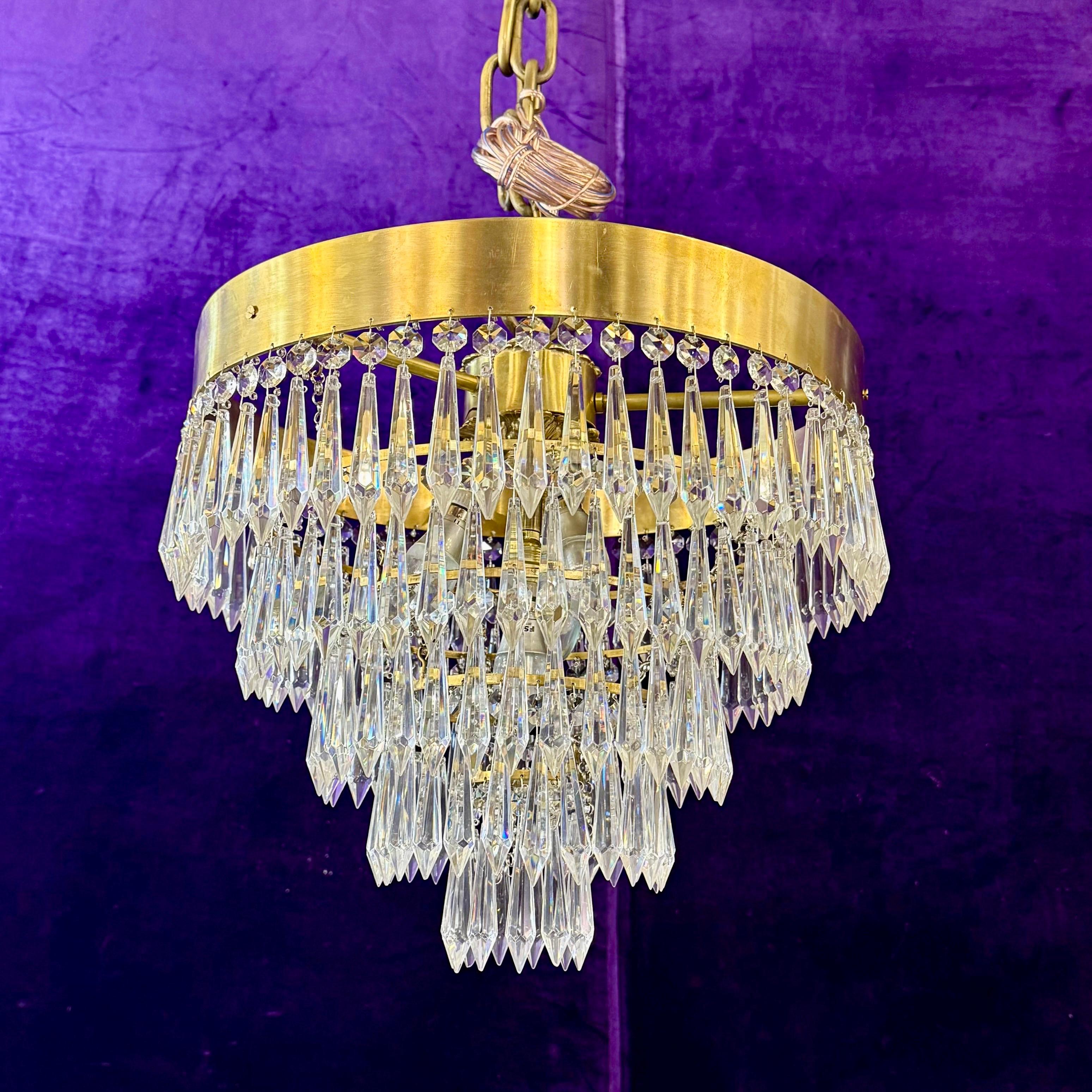 Delos Custom Waterfall Chandelier with Polished Brass Band and Spear Crystals