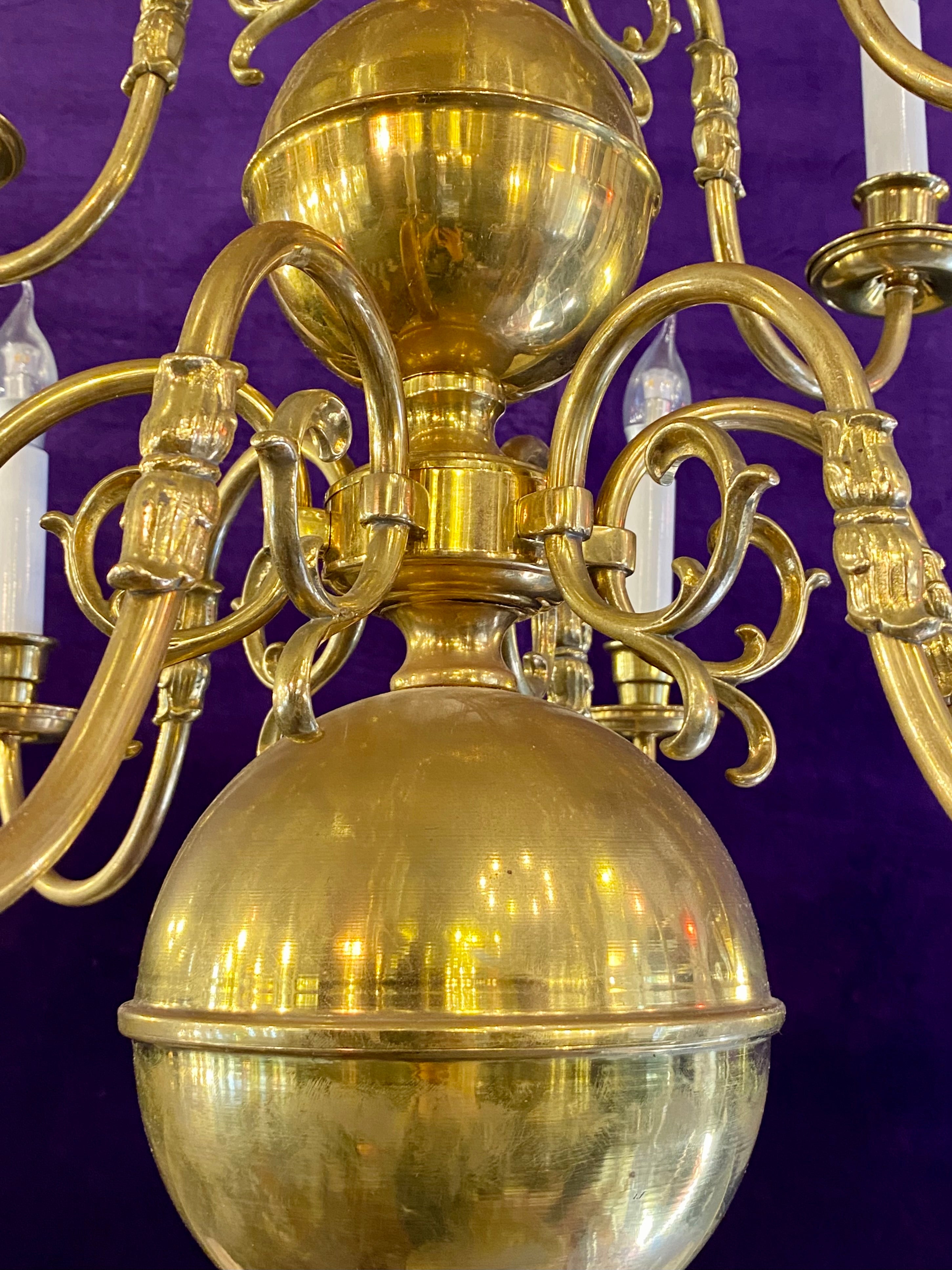 An Antique Polished Brass Double Tier Chandelier - SOLD