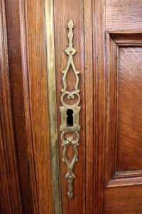 18th Century French Oak Armoire with Magnificent Brass Detailing