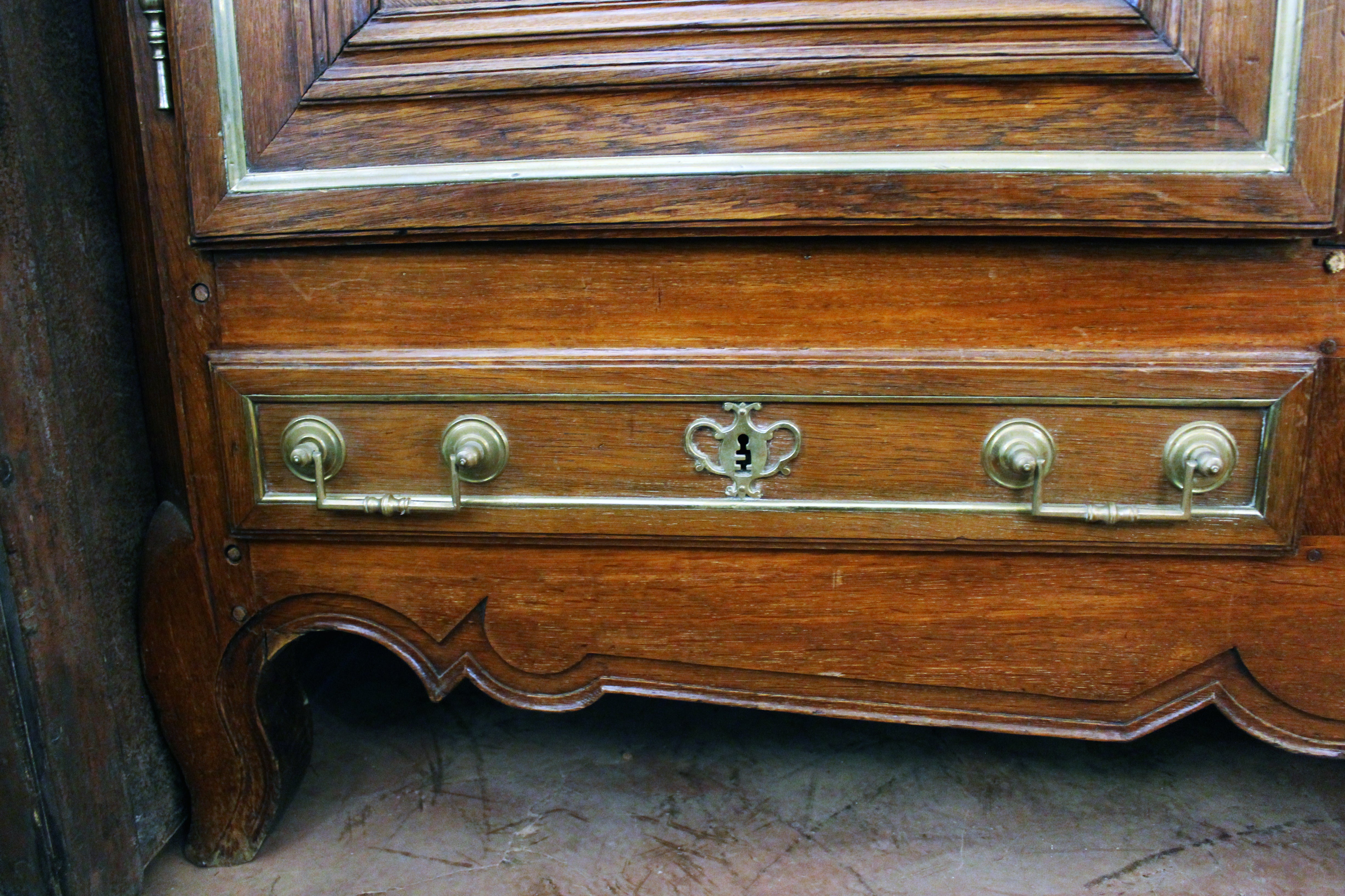 18th Century French Oak Armoire with Magnificent Brass Detailing