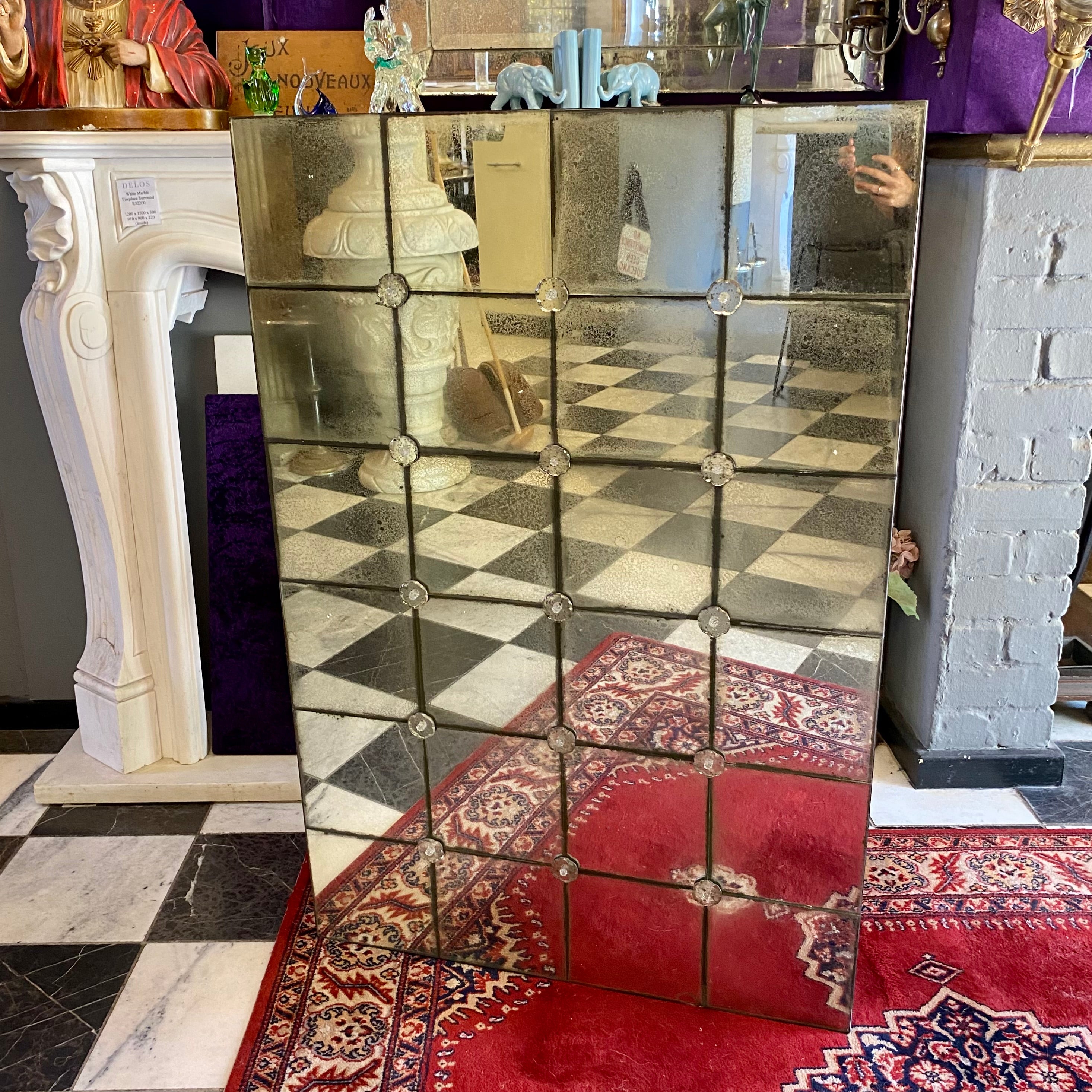 Aged Panelled Mirror with Rosettes