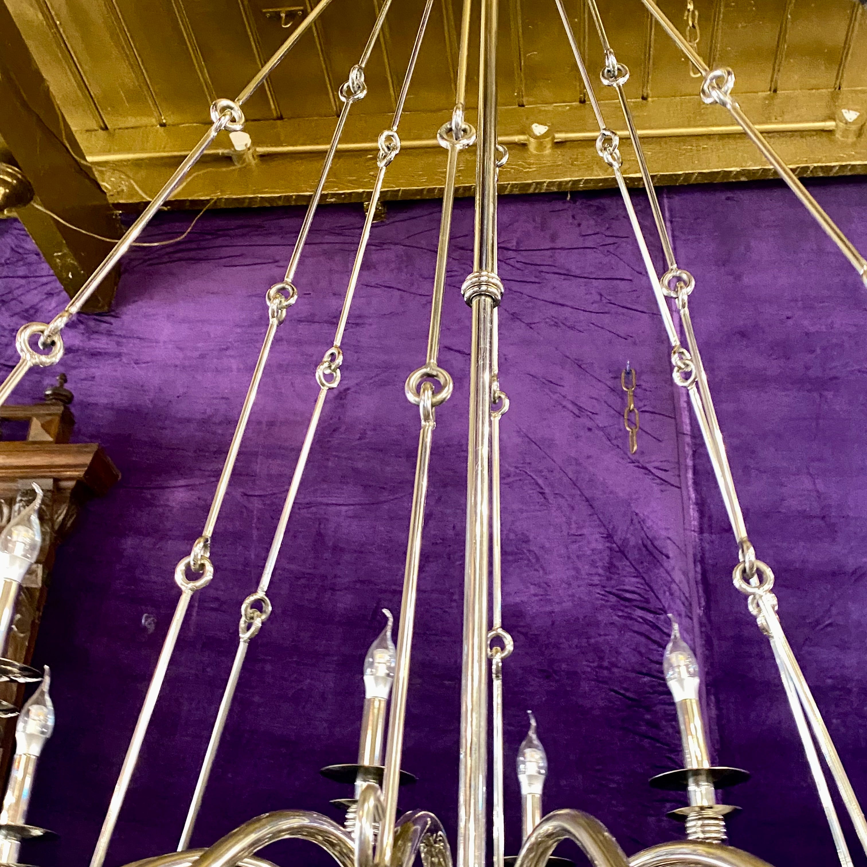 An Extremely Large Nickel Sixteen Arm Chandelier - SOLD