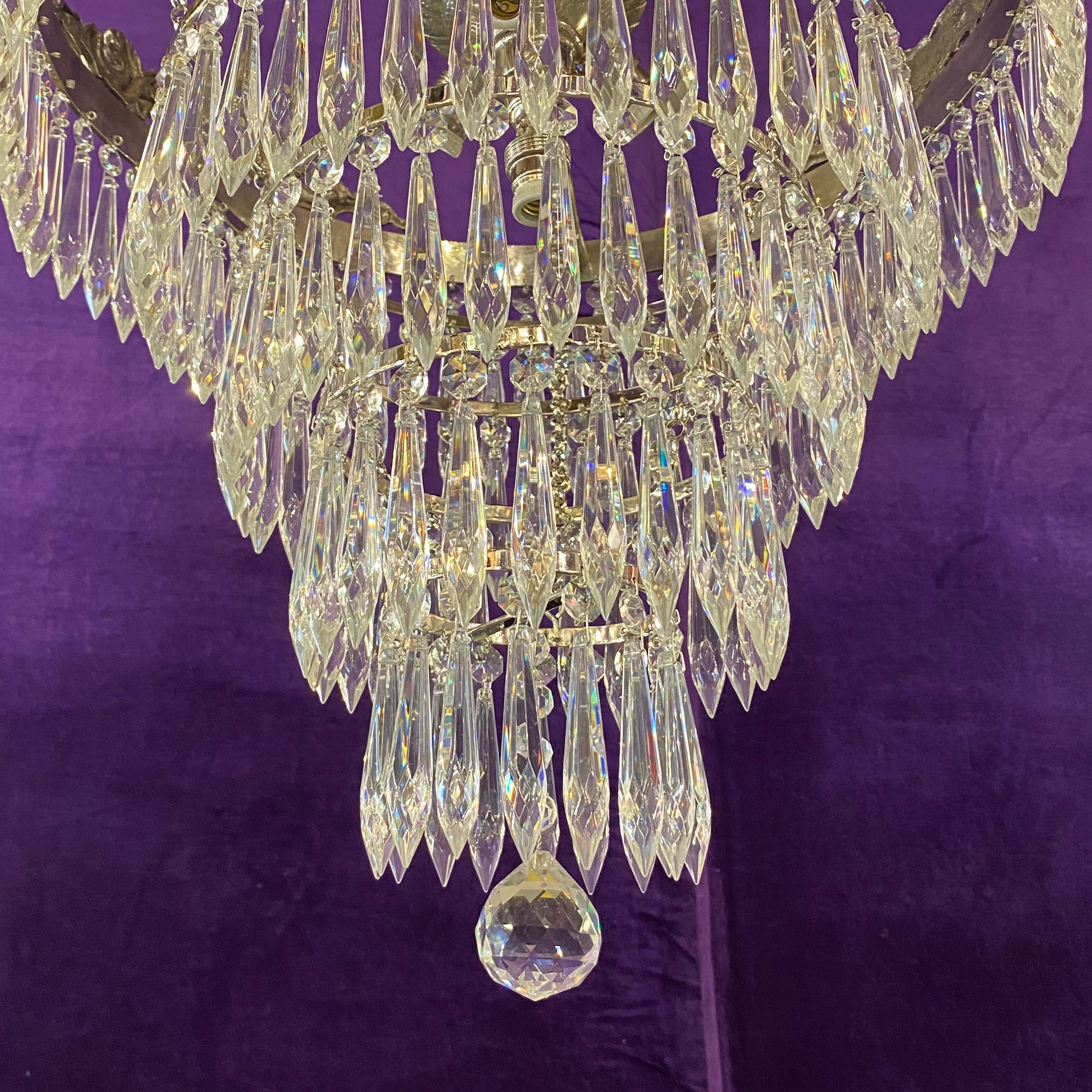 A Nickel and Crystal Waterfall Chandelier